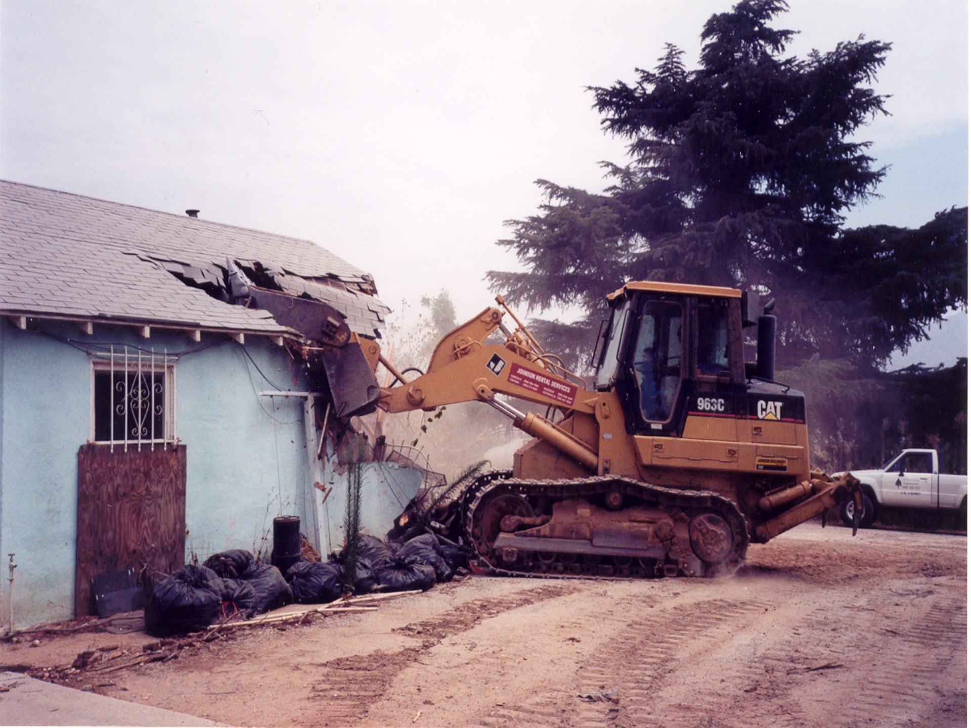 Big CAT Dozer Starting A House Demo